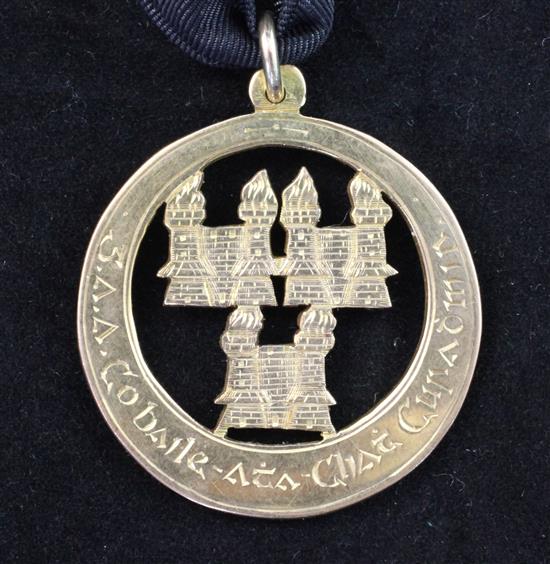 A George V Irish 9ct gold football related medallion, 1.25in.